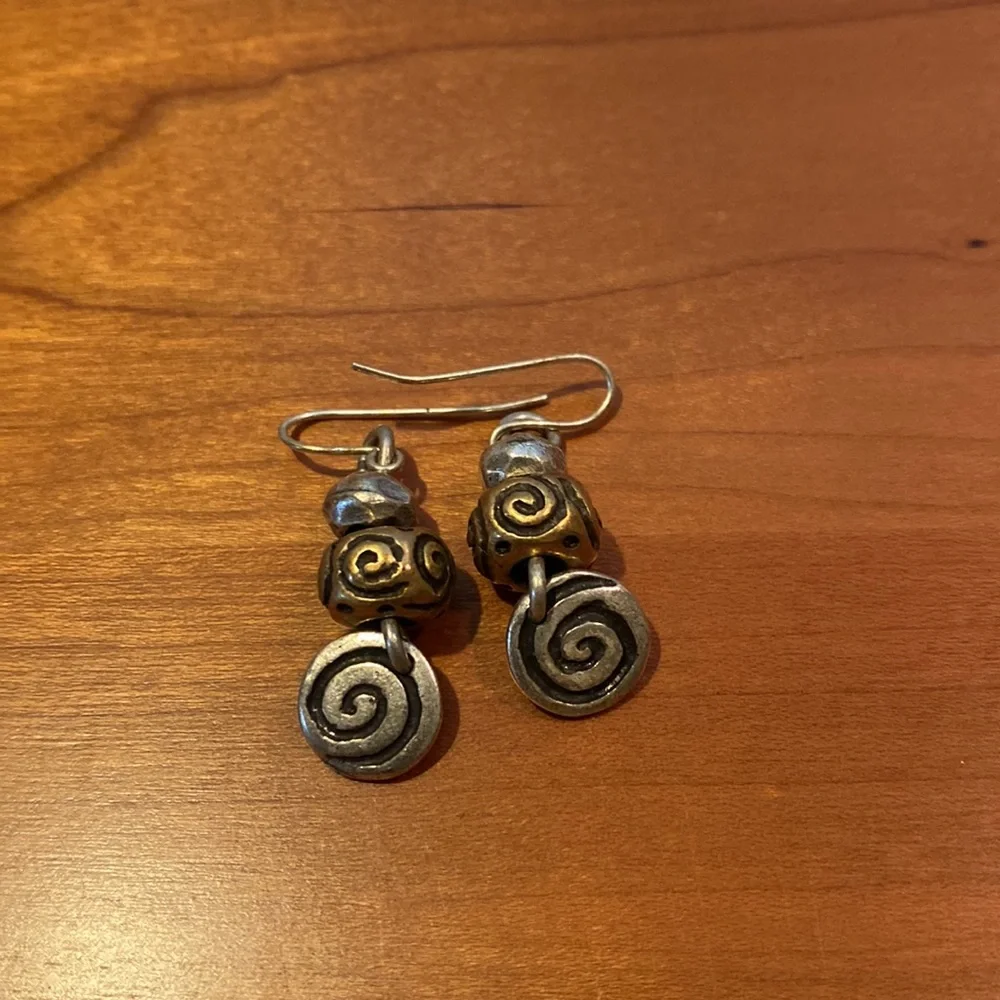 10 pairs of silver tone earrings